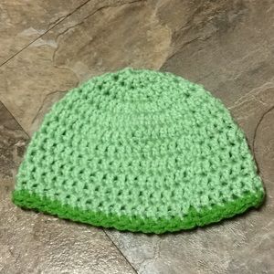 Green hand crocheted baby hat